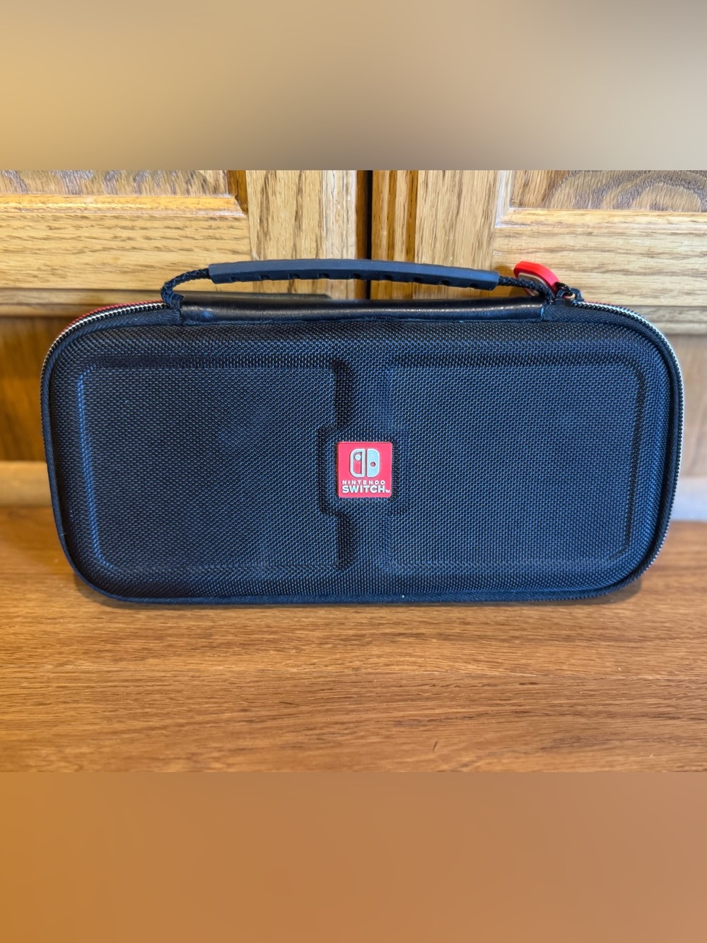 Nintendo Switch Black Carry Case with Red Logo Accent